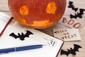 Pumkin head with bats, diary and pencil